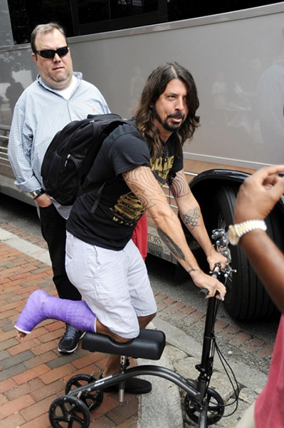 David Grohl using a Knee Scooter