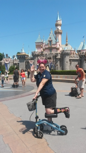  Kimberly going to Disneyland on her knee walker