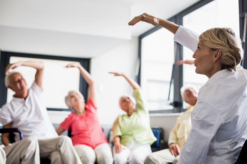 group of people doing stretches