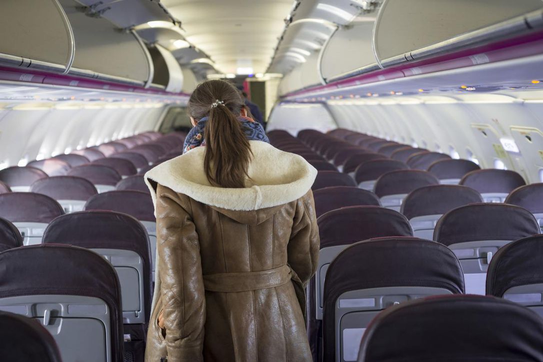 woman getting off a plane