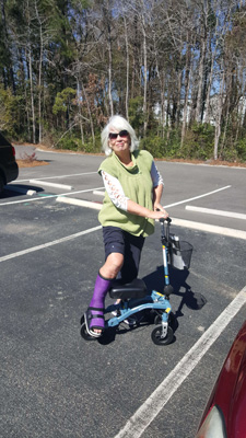 Woman on Swivelmate Knee Scooter