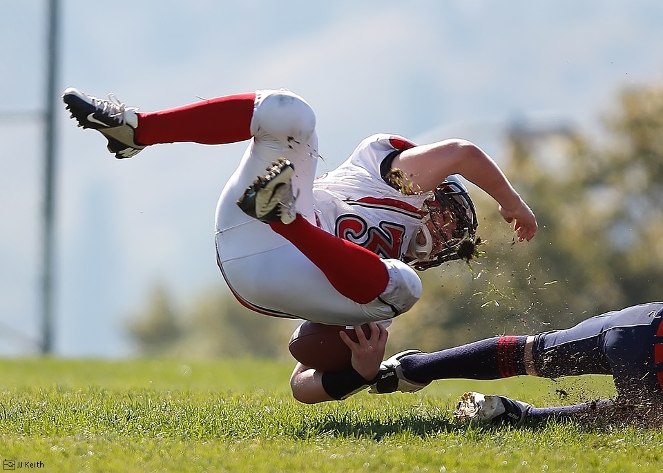 Football player getting tackled