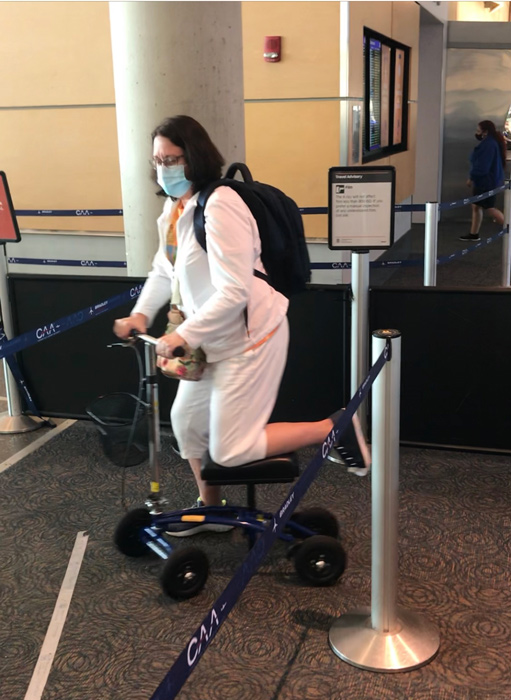 knee scooter patient navigating tsa line