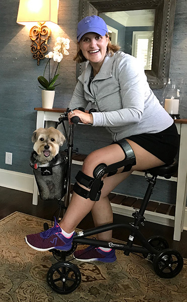 lady using seated knee scooter