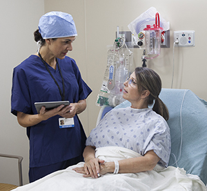 nurse talking to patient