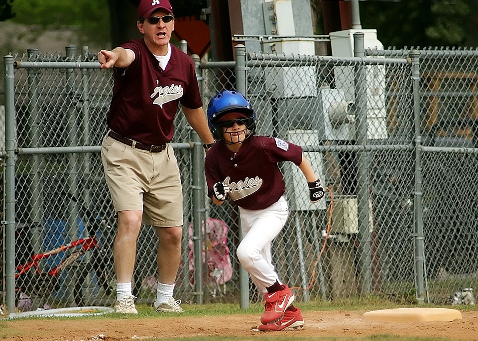 child playing baseball