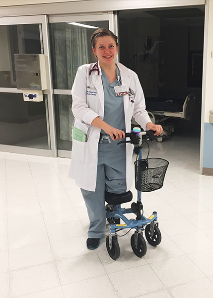 doctor inside a hospital using a knee scooter