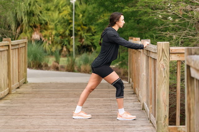 woman stretching outdoors