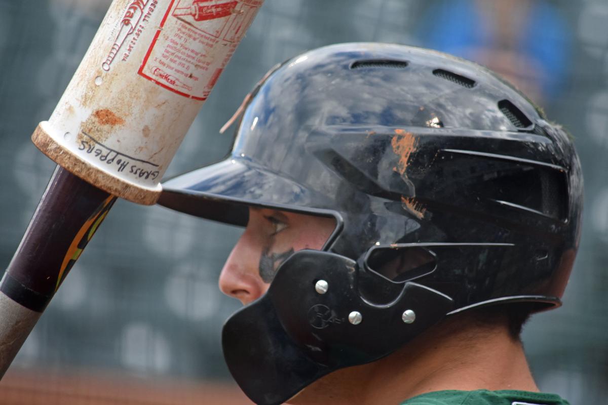 baseball player wearing helmet
