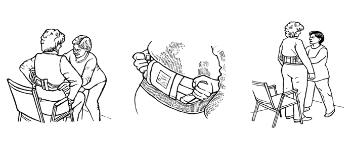 patient and caregiver using transfer belt