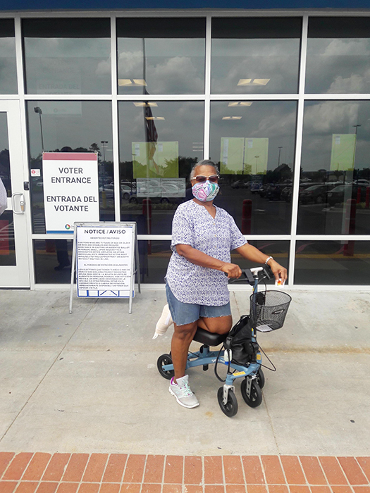 woman at voting office