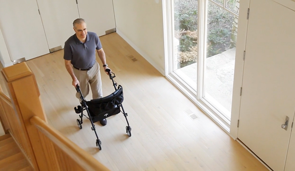 man using rollator